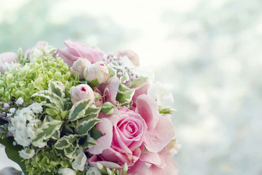 Wedding Bouquet With Roses And Greenery Wallpaper