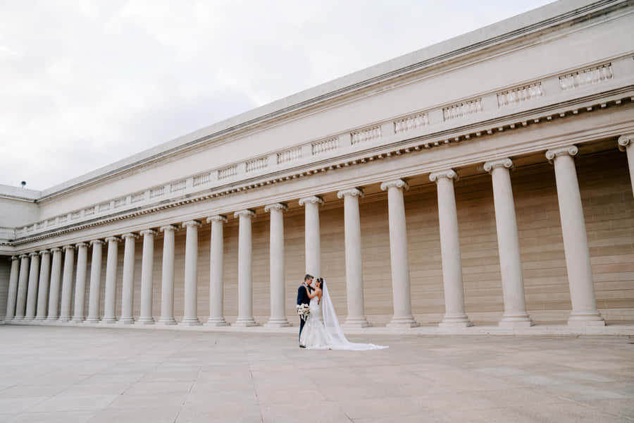 Wedding Coupleat Legionof Honor Colonnade Wallpaper