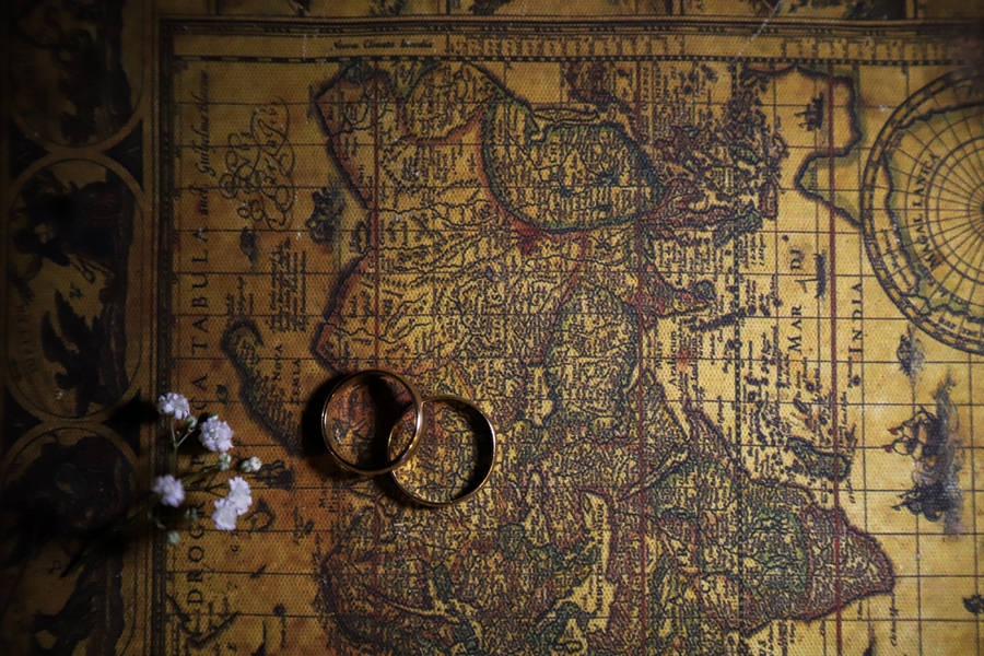 Wedding Rings On Topographic Map Wallpaper