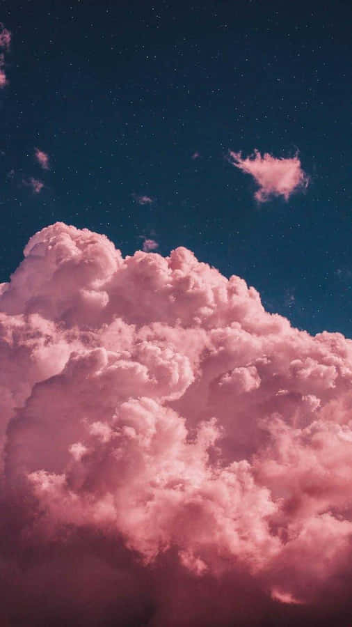 Whimsical Dreamy Sky- Cute Pink Clouds In Green Sky Wallpaper