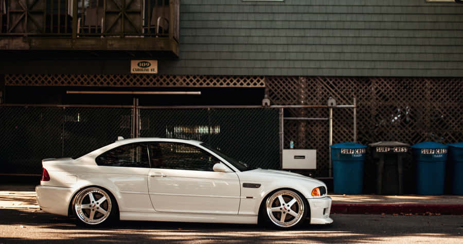 White B M W E46 Coupe Urban Backdrop Wallpaper