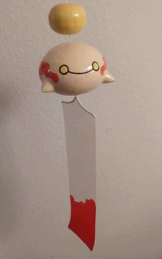 Wide Smile Of Chimecho Wallpaper