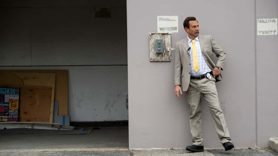 Will Arnett Striking A Pose At A Photoshoot Wallpaper