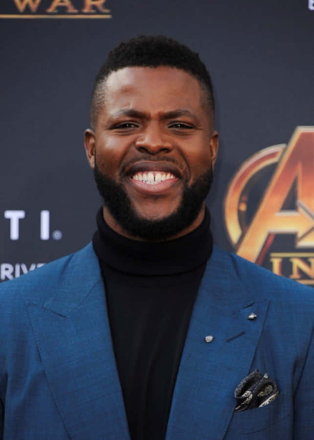 Winston Duke At A Premier Of Us Movie Wallpaper