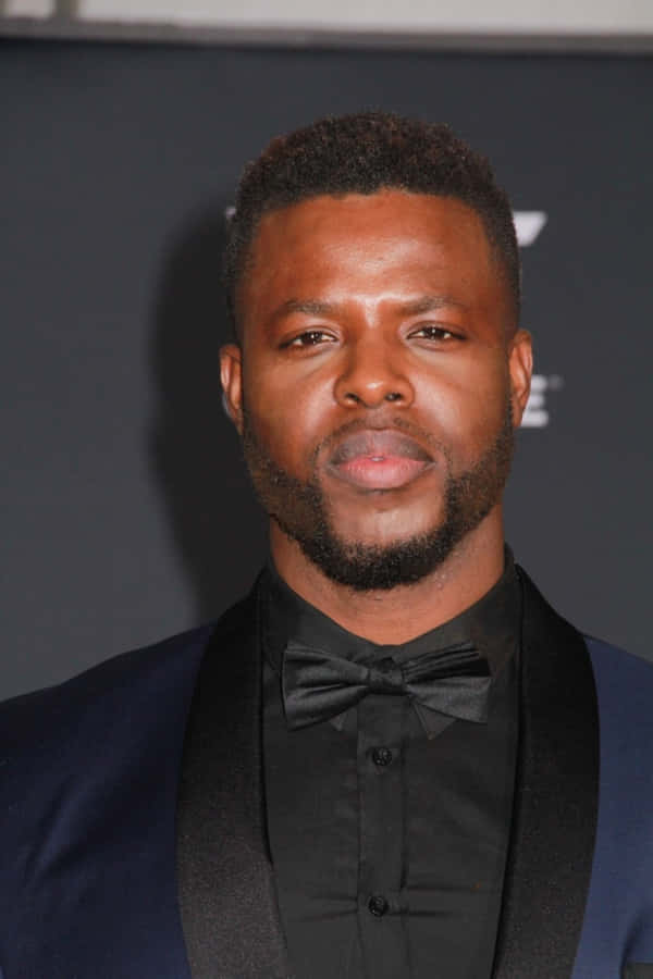 Winston Duke On A Red Carpet Wallpaper