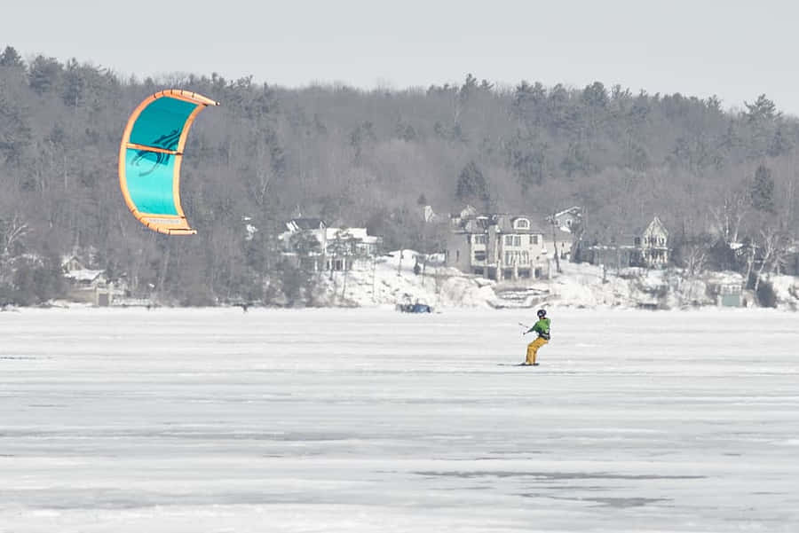 Winter Kite Surfingon Frozen Lake Wallpaper