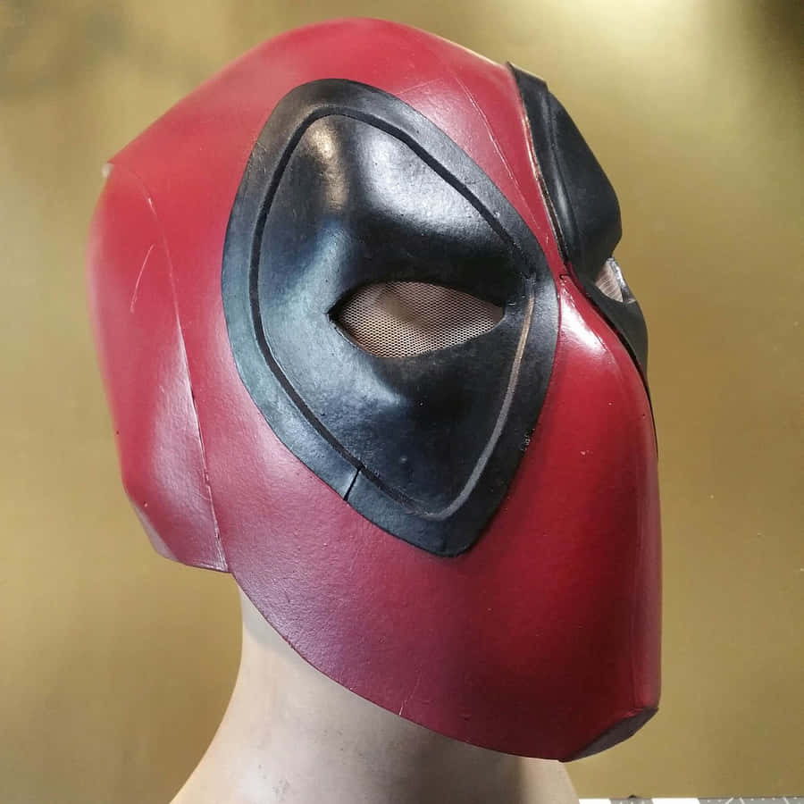 Witty And Fearless: The Iconic Deadpool Mask Wallpaper
