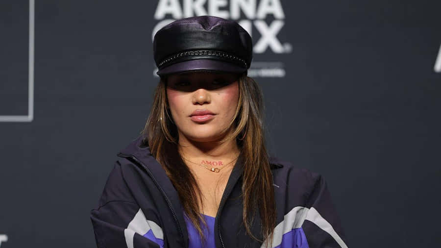 Womanin Leather Capand Track Jacket Wallpaper