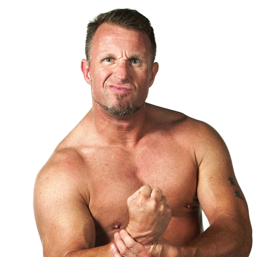 Wrestler Doug Williams Flexing His Muscles Wallpaper