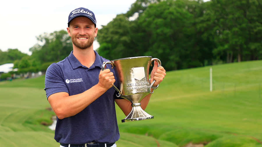 Wyndham Clark In Action On A Sunny Golf Course Wallpaper
