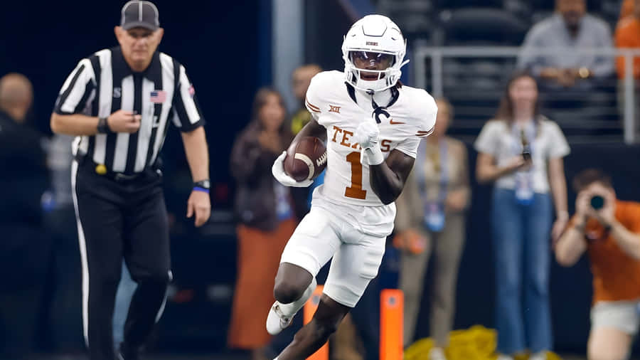 Xavier Worthy Football Action Wallpaper