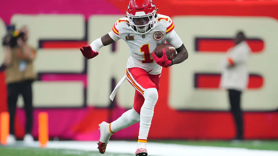 Xavier Worthy Football Highlight Wallpaper