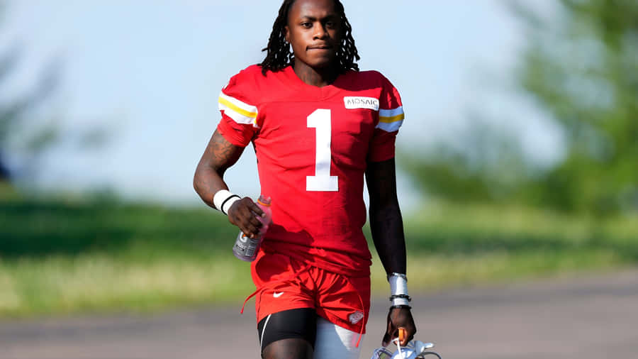 Xavier Worthy Football Star Wallpaper