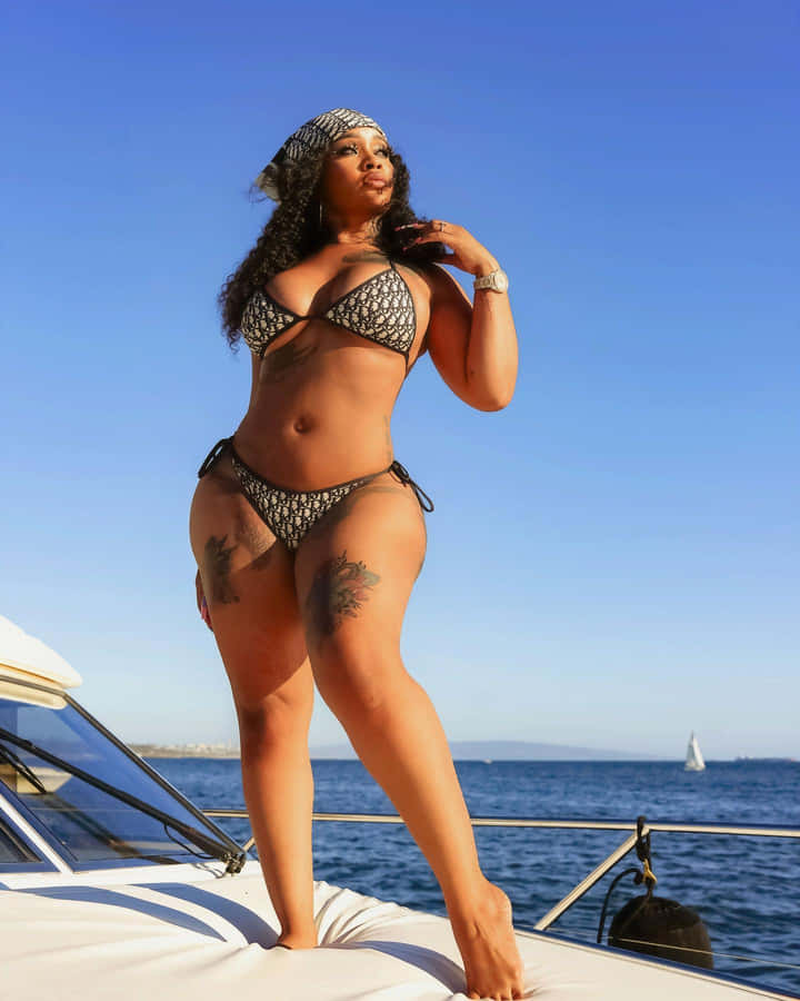 Yacht Side Glamour Pose Wallpaper