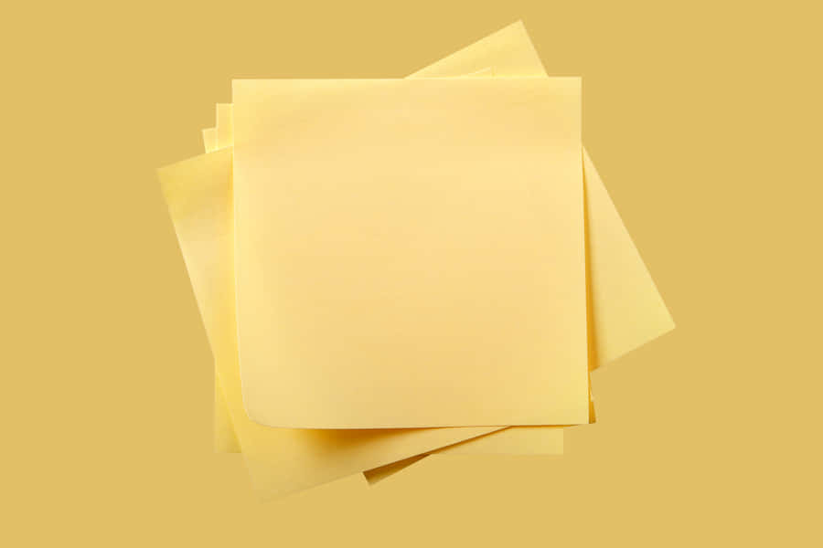 Yellow Post It Noteson Yellow Background Wallpaper