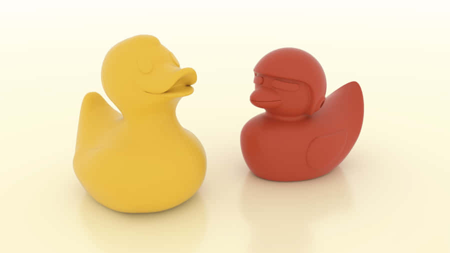 Yellowand Red Rubber Ducks Together.jpg Wallpaper