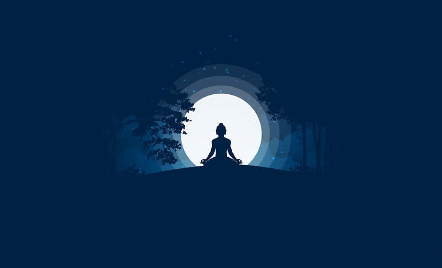 Young Man In A Serene Environment Practicing Concentration During Meditation Wallpaper
