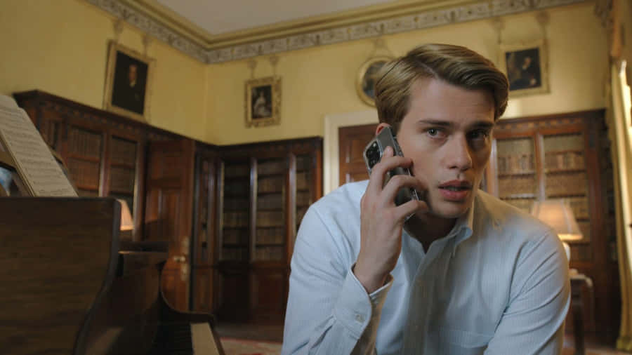 Young Man On Phone In Elegant Room Wallpaper