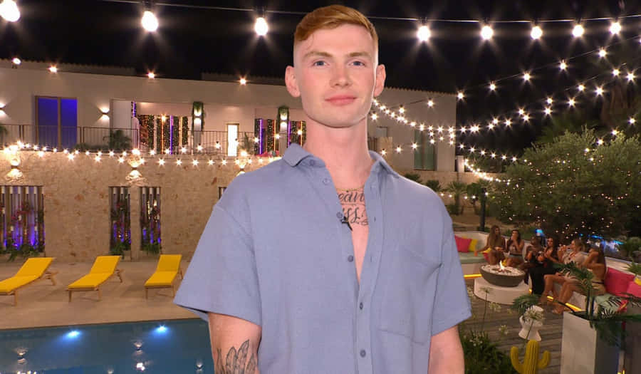 Young Man Poolside Night Event Wallpaper