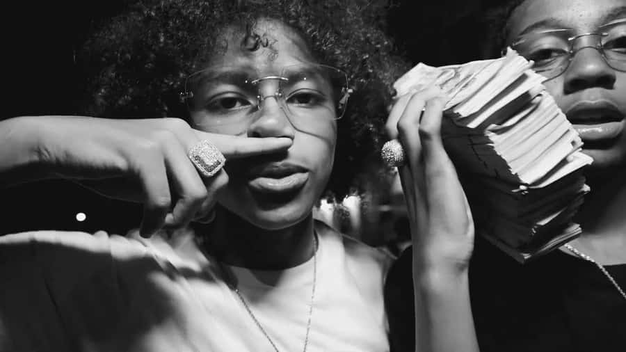 Youth With Cashand Jewelry Wallpaper