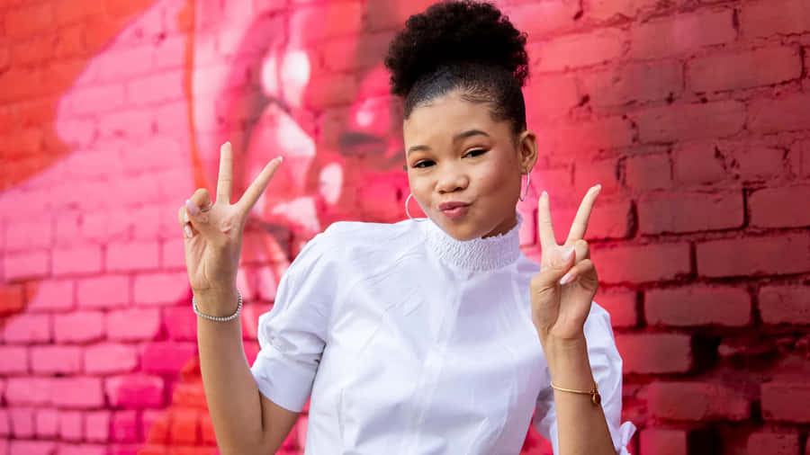 Youthful Vibes Peace Signs Red Brick Background Wallpaper