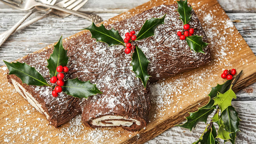 Yule Log Cake With Holly Wallpaper