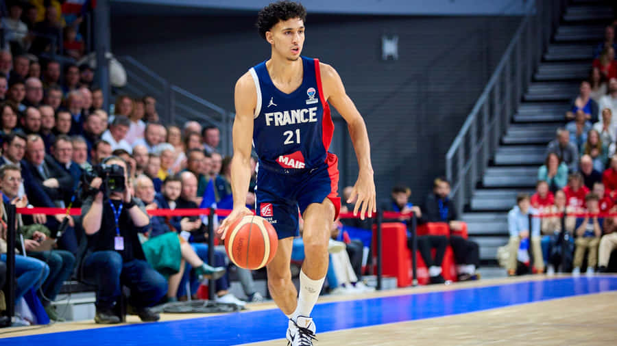 Zaccharie Risacher Basketball Action Wallpaper