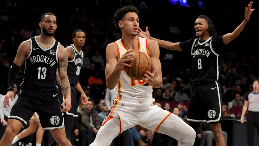 Zaccharie Risacher Basketball Action Wallpaper