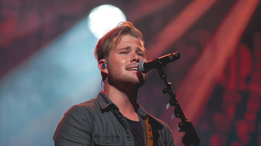 Zach Bryan Live Performance Wallpaper