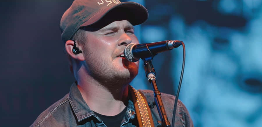 Zach Bryan Performing Live Wallpaper