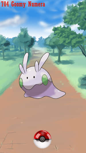 1. Image A Goomy Gently Nestled In Its Poke Ball Wallpaper