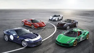 1440p Ferrari Luxury Racing Cars Wallpaper