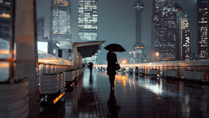 1920 X 1080 Night City Woman With Umbrella Wallpaper