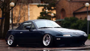 1995 Mazda Mx 5 Miata Navy Blue Sports Car Wallpaper