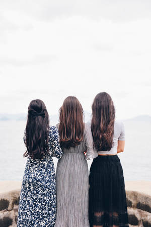 3 Lady Best Friends Back View Wallpaper