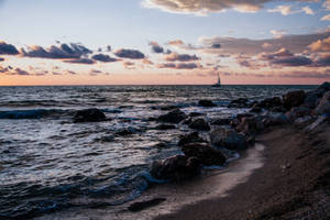 4k Beach With Rocky Shore Wallpaper