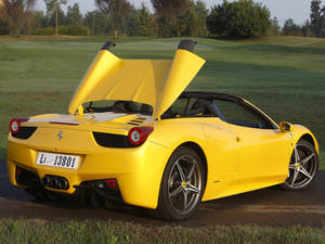 4k Ferrari Yellow Spider Open Top Wallpaper