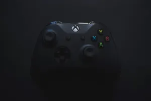 4k Gaming Consoles In Action Wallpaper