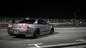 4k Jdm Nissan Skyline In Parking Lot Wallpaper