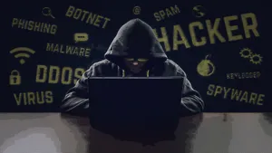 4k Laptop Hooded Hacker Man Wallpaper
