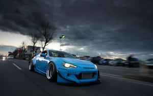 4k Toyota 86 Blue Car Drive Dark Clouds Wallpaper