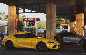 4k Toyota Supra At Gas Station Wallpaper