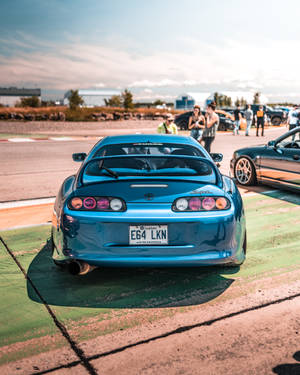 4k Toyota Supra Quebec Blue And Black Wallpaper