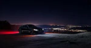 4k Ultra Hd Black Car At Night Wallpaper
