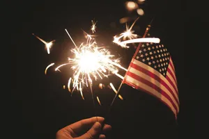 4thof July Sparklerand Flag Wallpaper