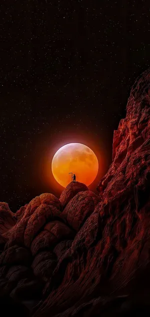 8k Iphone Man Against A Moonlit Night Wallpaper