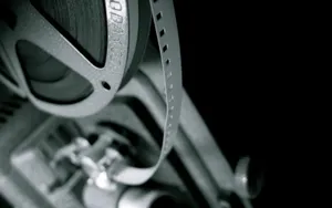 A 4k Projector Illuminating A Movie Night Wallpaper