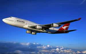 A 747 Commercial Airplane Taking Off Wallpaper