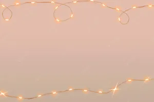 A Background With String Lights On A Beige Background Wallpaper