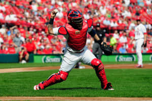 A Baseball Player Is Catching A Ball Wallpaper